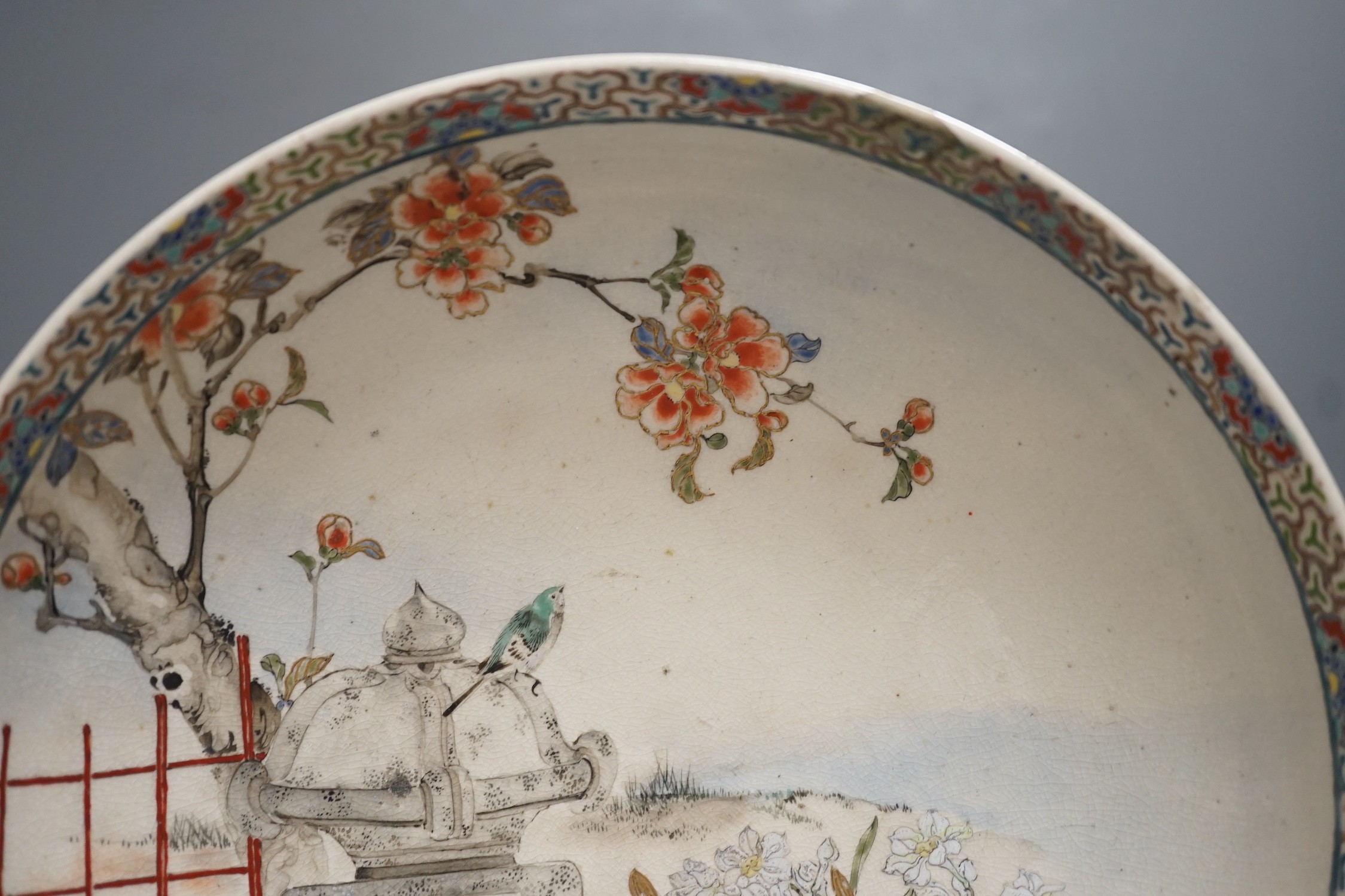 A Japanese Satsuma pottery dish, Meiji period, three character inscription, 23cms diameter